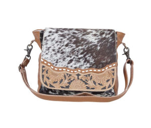 MANGNIFIQUE HAND-CONCEALED BAG